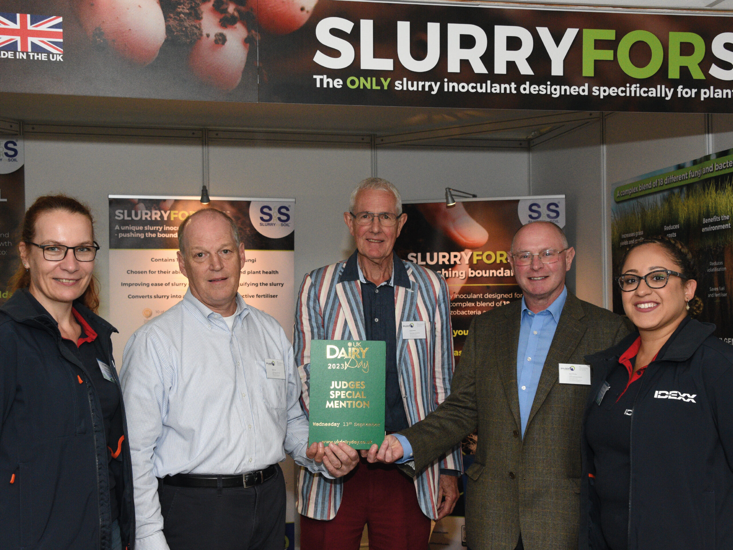 Directors of Slygen Animal Health receiving certificate of Judges' Special Mention at the stand at UK Dairy Day 2023.